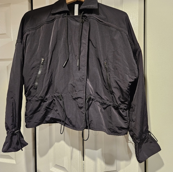 ATHLETA Black Acadia jacket small pockets adjustable ties weather resistant - Picture 7 of 7